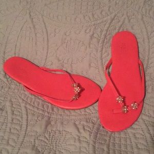 Hot pink flip flops